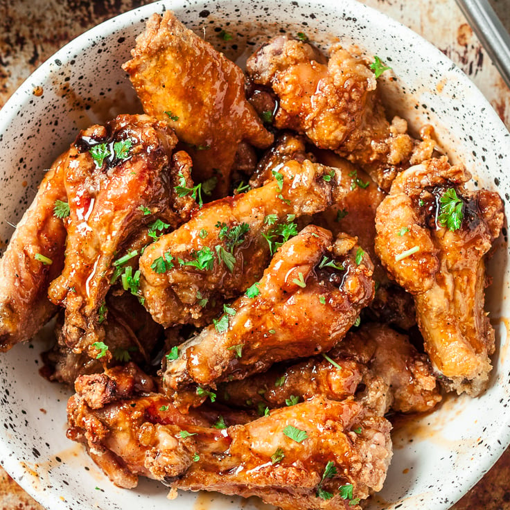 sriracha buffalo wings in a bowl