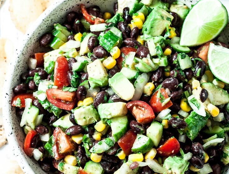 avocado salsa in a bowl with tortilla chips