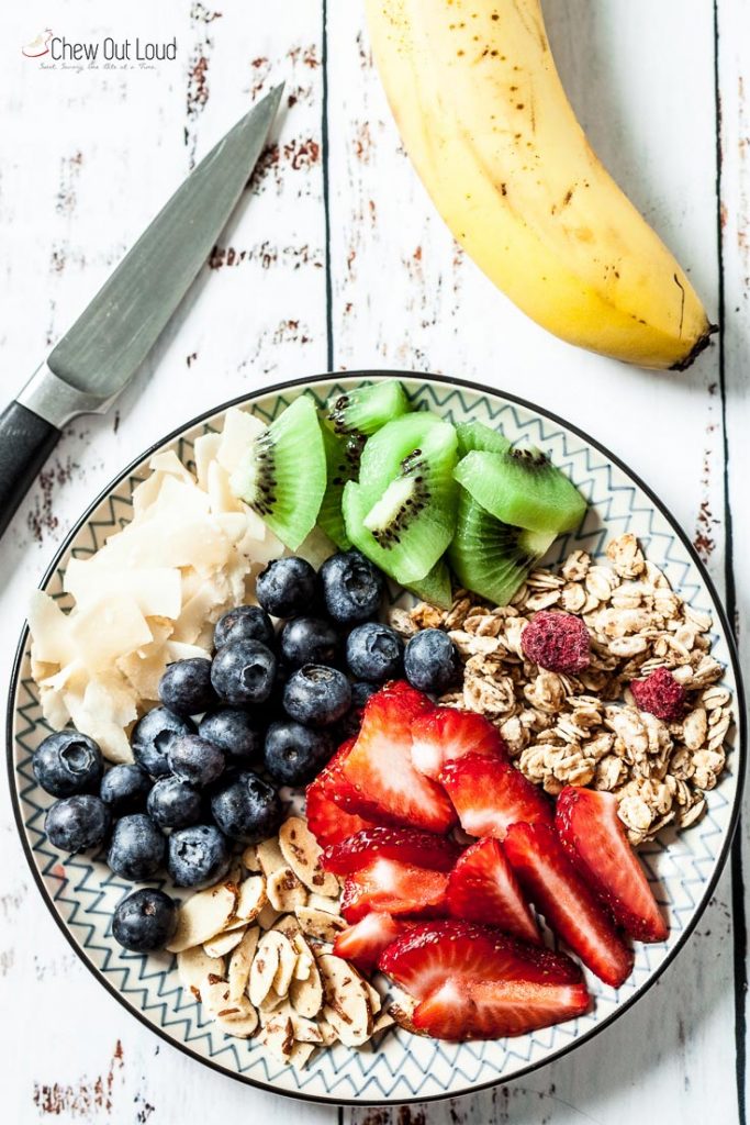 acai smoothie with berries and granola