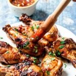 Grilled chicken legs cooked and brushed with Asian style BBQ sauce.