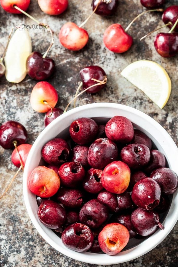 fresh pitted cherries in a bowl