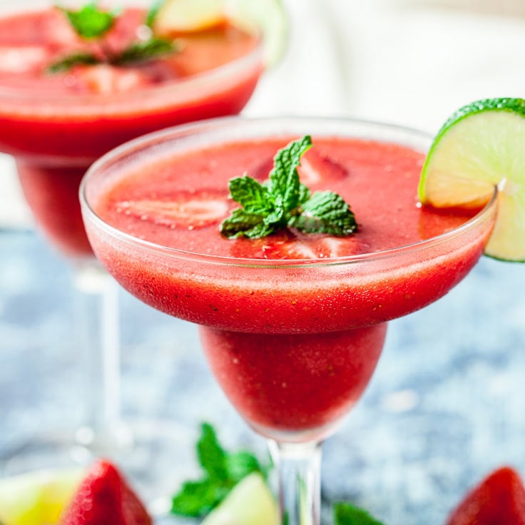 frozen strawberry margaritas in glasses