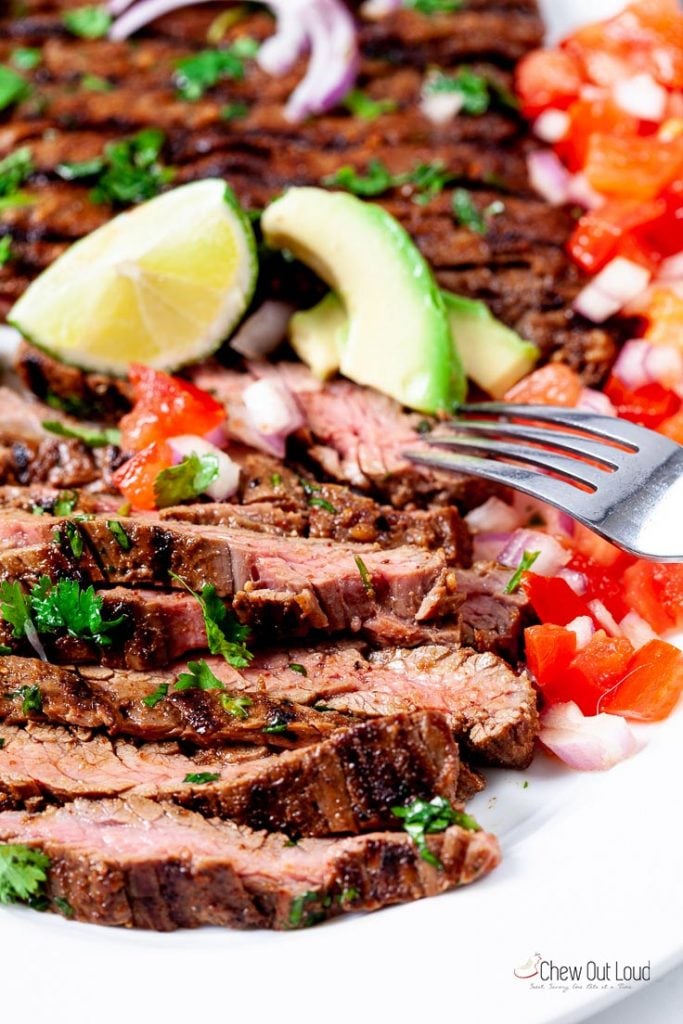 carne asada sliced on a serving plate