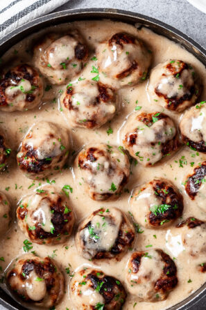 swedish meatballs with gravy in a pan