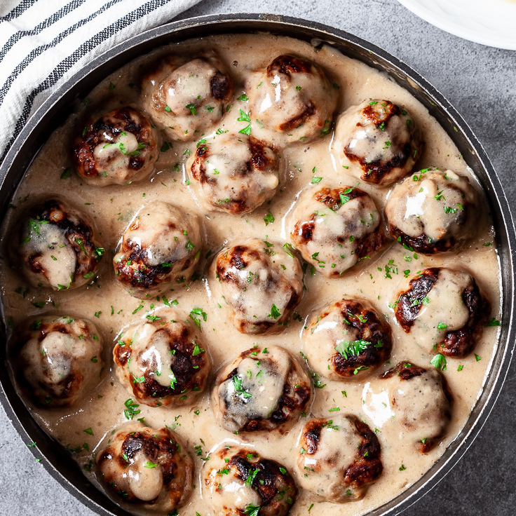 swedish meatballs with gravy in a pan