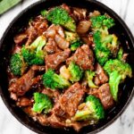 beef and broccoli in a pan