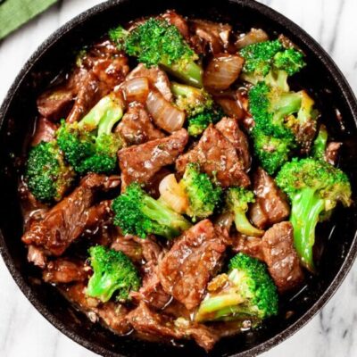 beef and broccoli in a pan