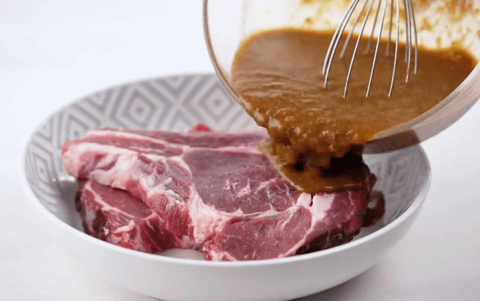 Making the marinade and coating the steak.