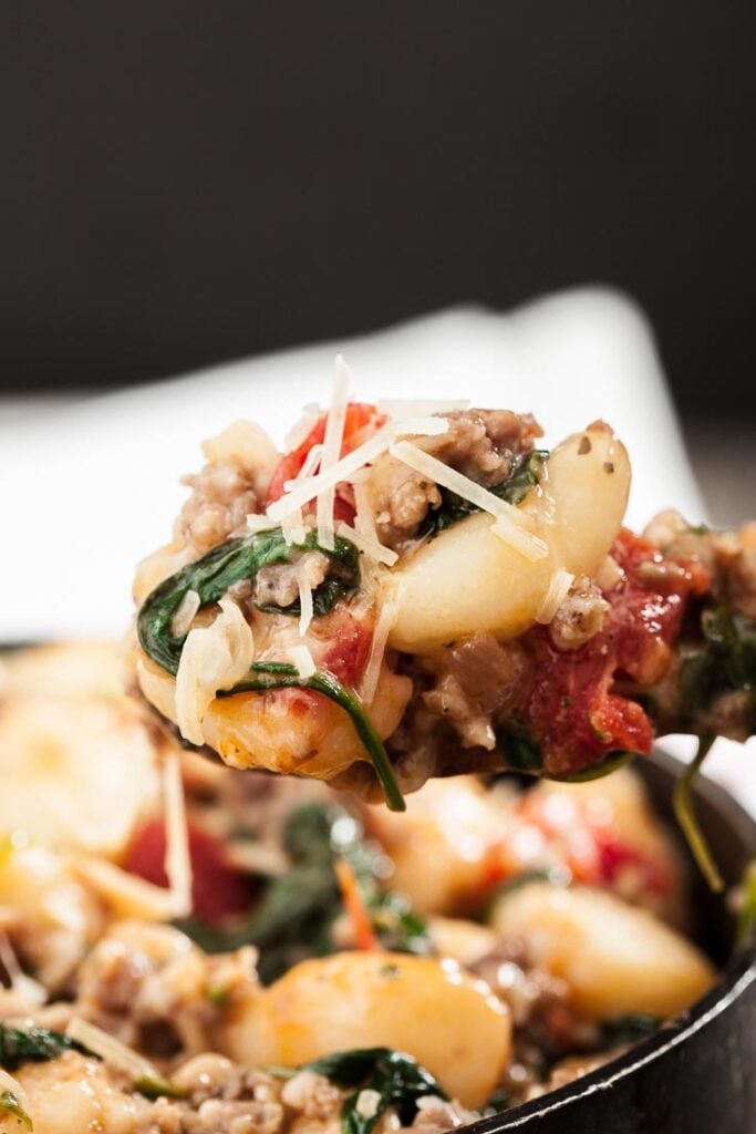 Gnocchi with sausage, spinach, and tomatoes 