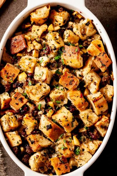 Homemade Stuffing with Sausage and Apples in White Dish Square