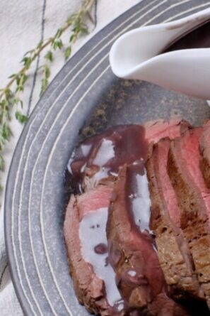 Beef Tenderloin on a plate with wine sauce