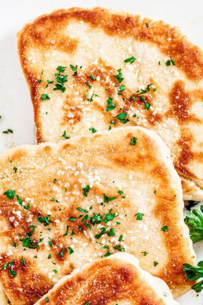 slices of flatbread on white plate