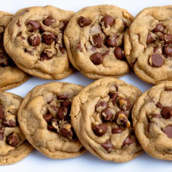 Peanut butter chocolate chip cookies on a white plate