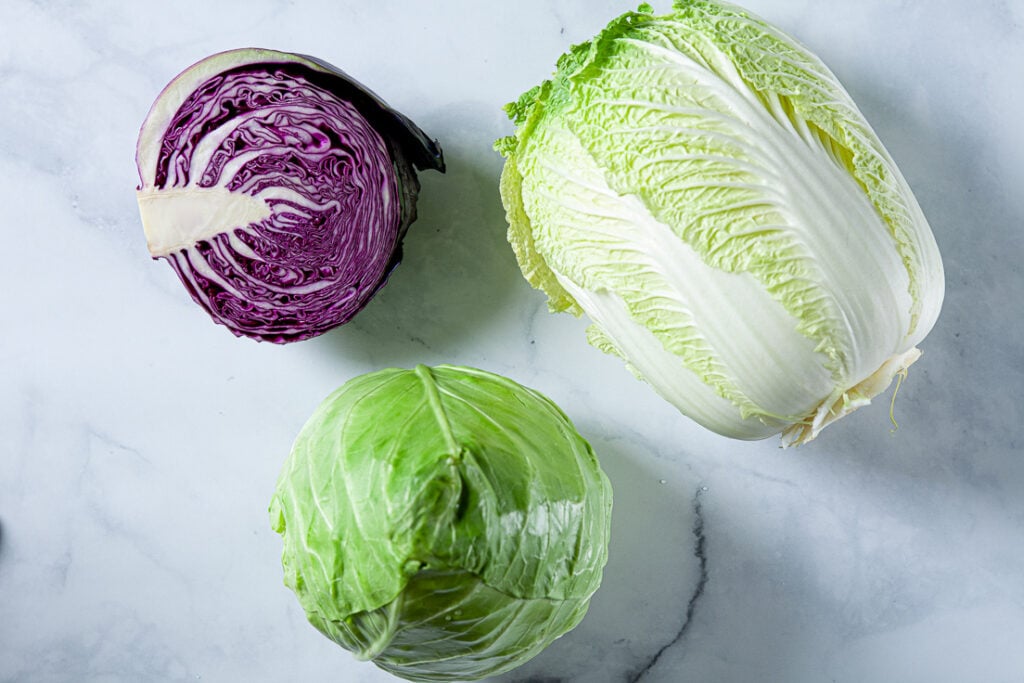 napa cabbage, red cabbage, and green cabbage