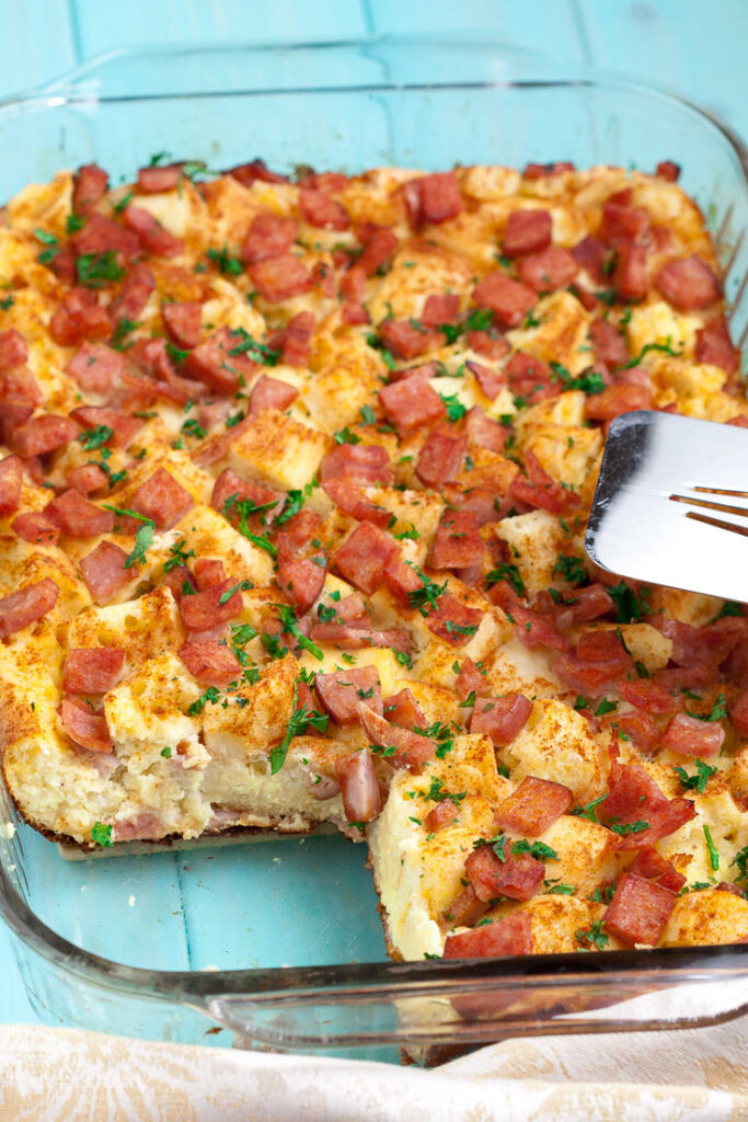 Eggs Benedict Casserole in Dish Vertical