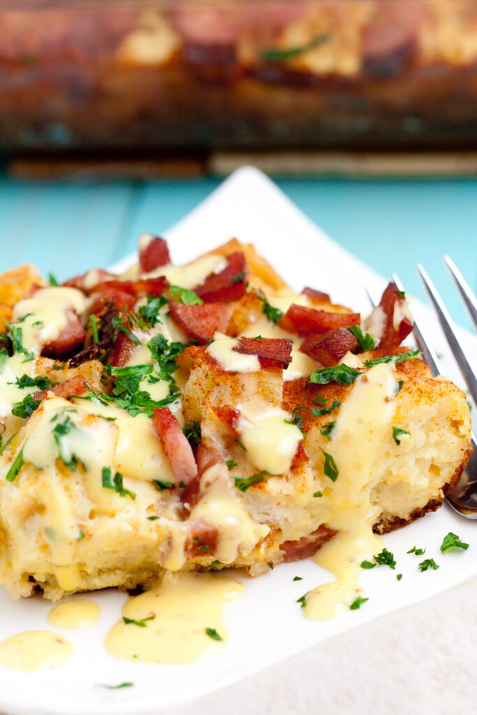Eggs benedict casserole on dish vertical