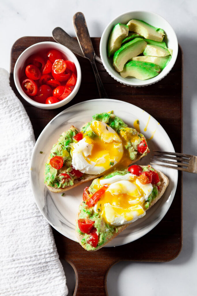 Poached Eggs on Avocado Toast on plate