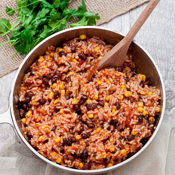 Chicken Enchilada Casserole with rice in a pot