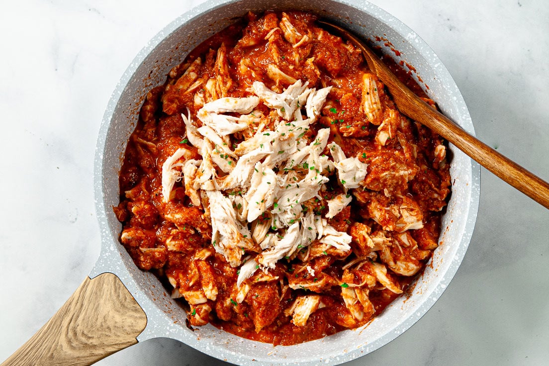 chicken tinga tacos in skillet