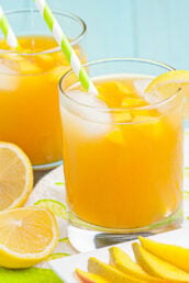 mango cocktails in glasses with ice