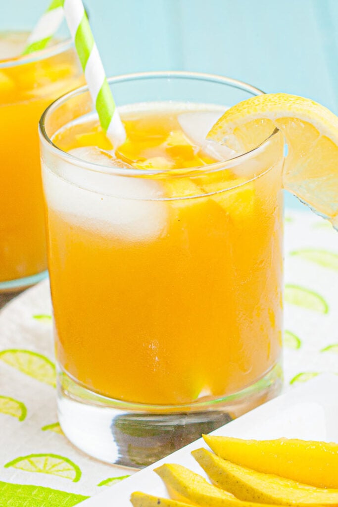 mango cocktail in glasses with ice
