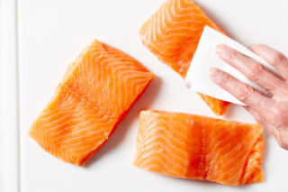 Fresh Salmon Fillets being dried