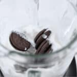 Adding the Oreo cookies into the blender.