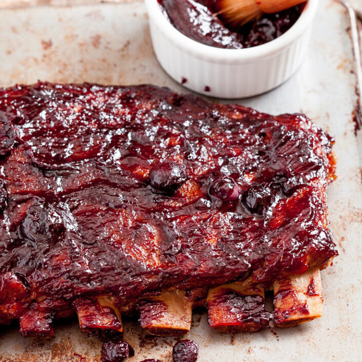 Ribs in the Oven with Blueberry BBQ Sauce Chew Out Loud