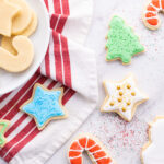 vanilla cut out cookies with icing and sprinkles