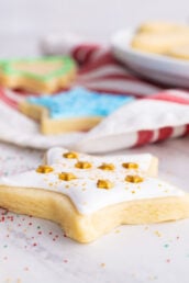 vanilla cut out cookies with icing and sprinkles