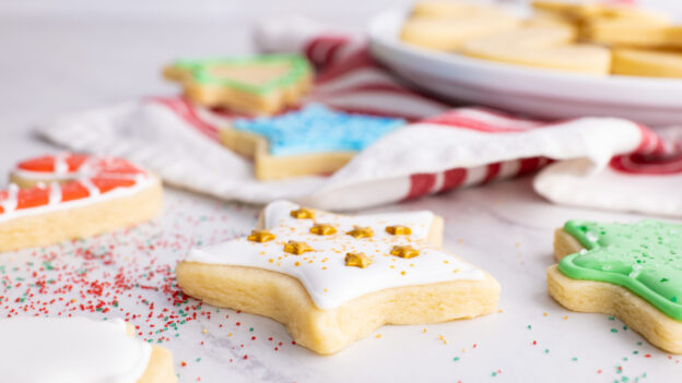 vanilla cut out cookies with icing and sprinkles