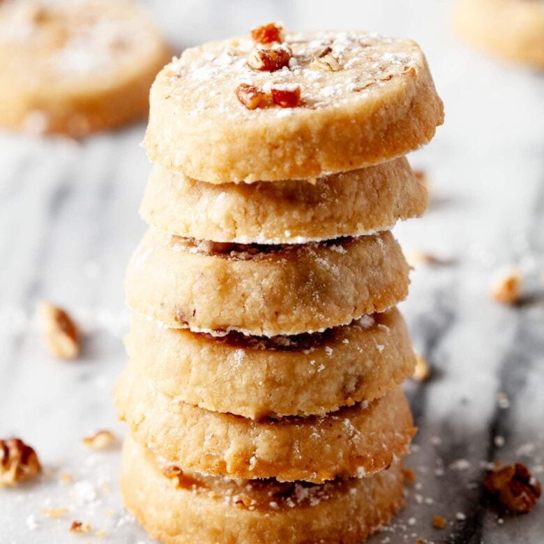 pecan sandies stacked on top of each other.