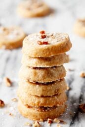 Pecan Sandies Shortbread Cookies piled on top of each other.