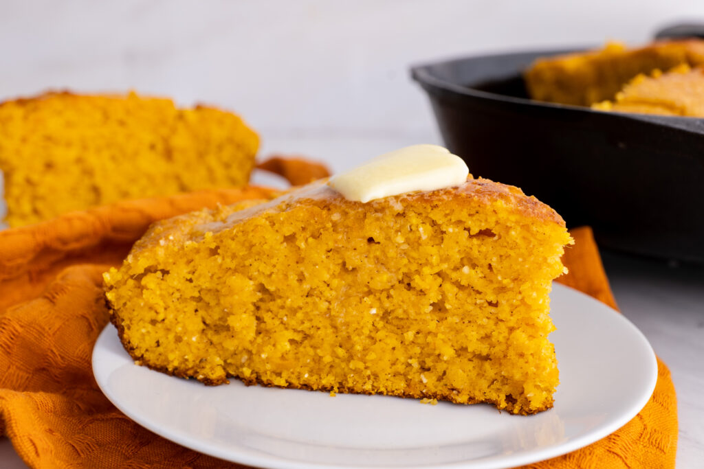 sweet potato cornbread sliced and plated.