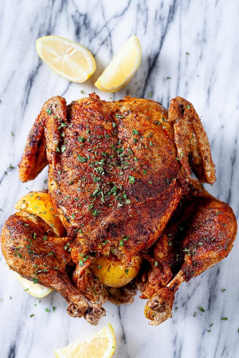 instant pot whole chicken on a marble cutting board