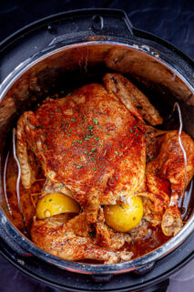 Whole chicken in rotisserie pot