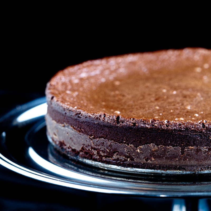 Flourless Chocolate Cake on cake platter