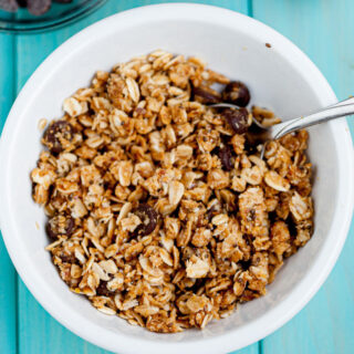 stirring ingredients for energy bites in a bowl