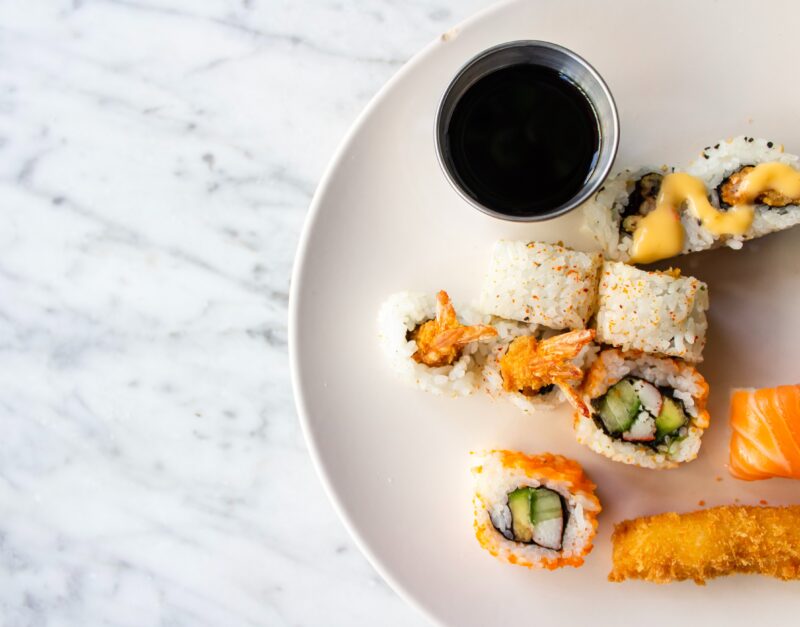 tamari sauce in a bowl with sushi