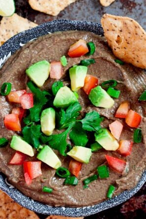 Black Bean Dip with Avocado in a Bowl with Chips