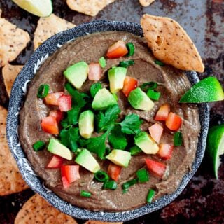 Black Bean Dip with Avocado in a Bowl with Chips