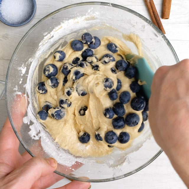Fold blueberries into coffee cake batter.