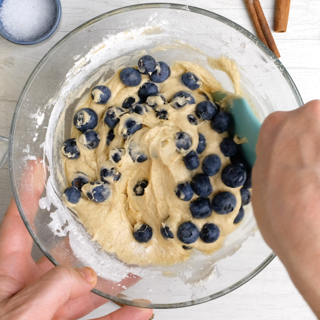 Fold blueberries into coffee cake batter.