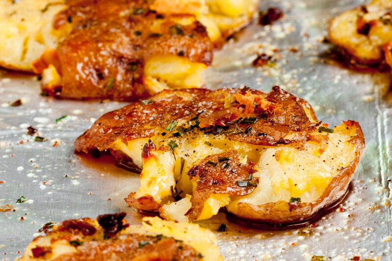 smashed potatoes on tin foil.