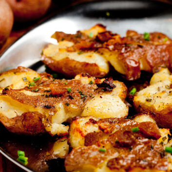 smashed potatoes on a plate