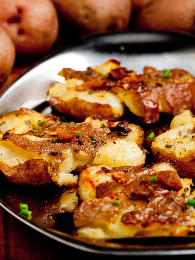 smashed potatoes on a plate