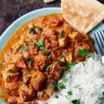 chicken tikka masala served with rice.