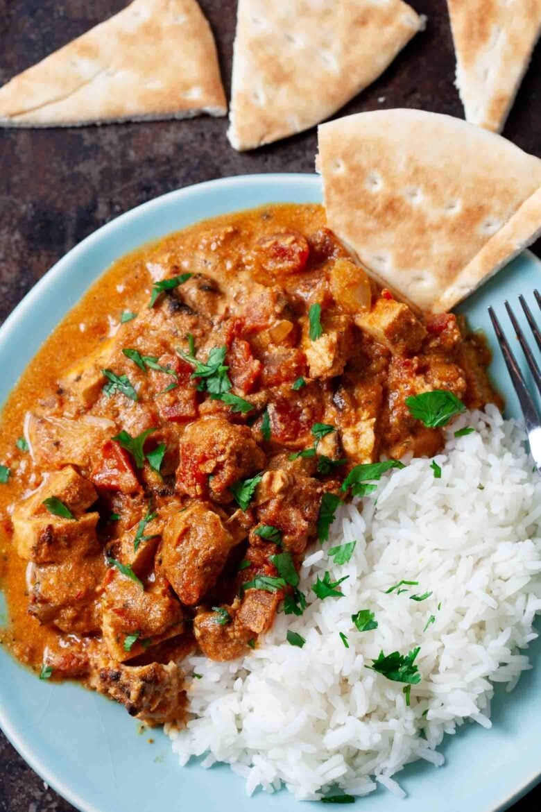 chicken tikka masala served with rice.