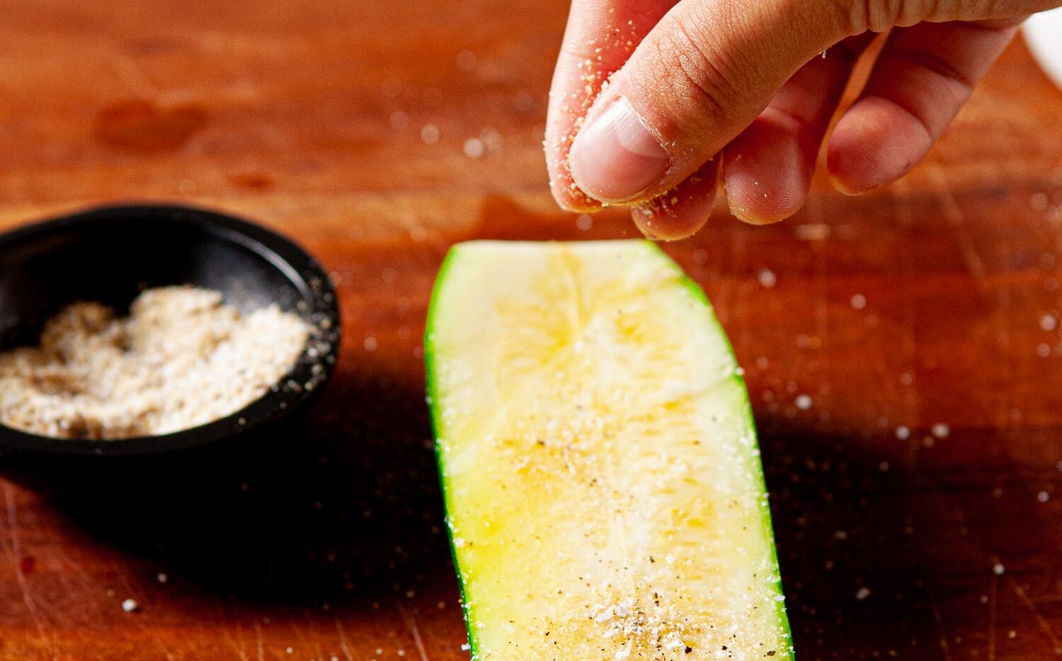 zucchini halves sprinkled with salt and pepper