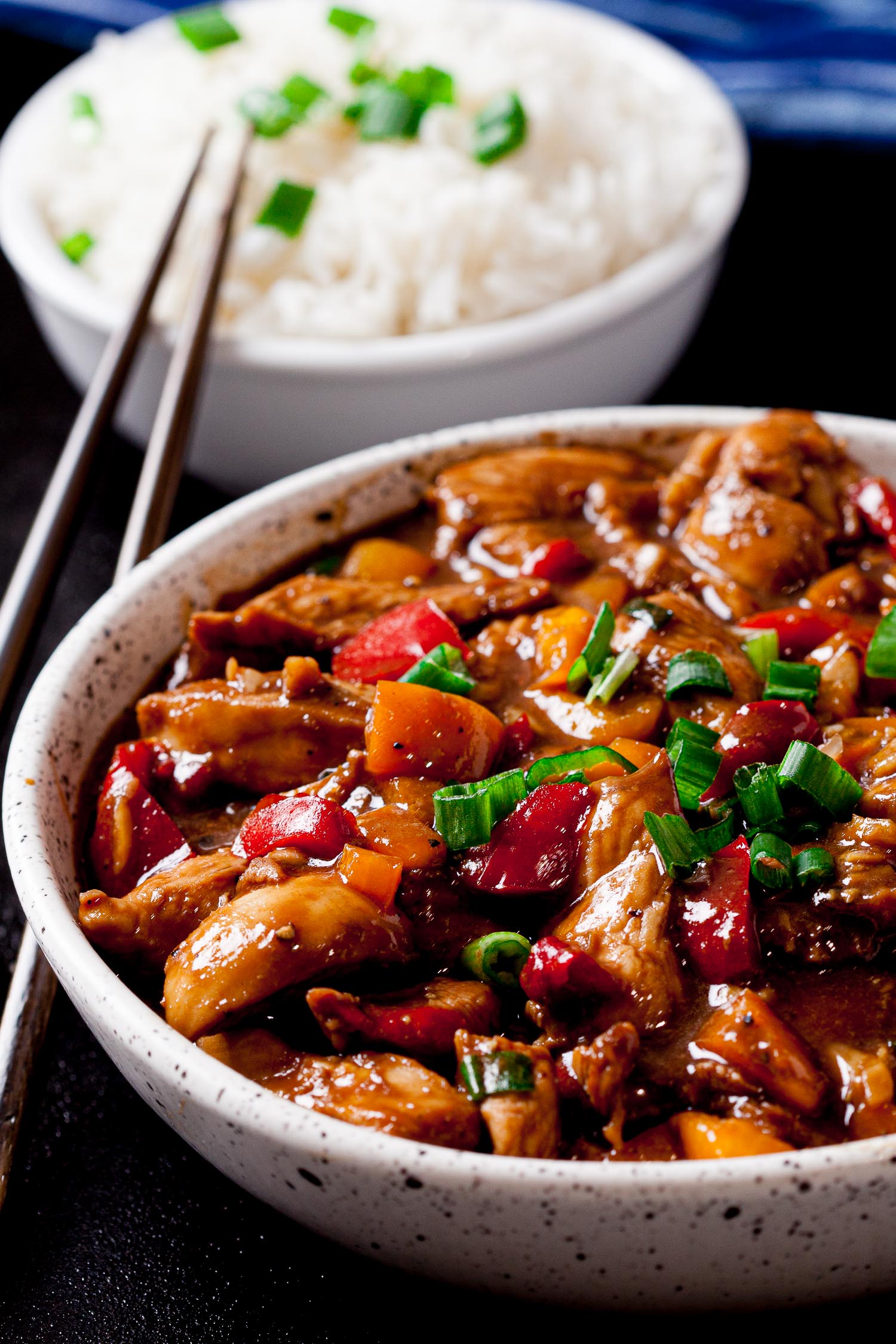 kung pao chicken in bowl with rice